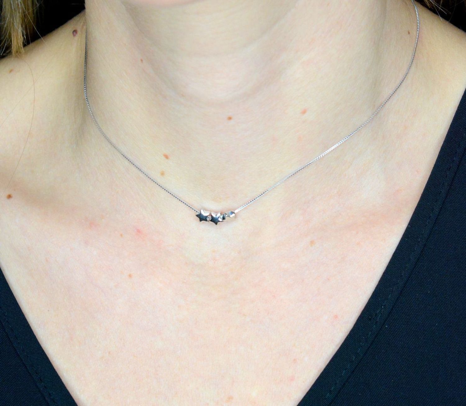 Naszyjnik damski srebrny 925 z gwiazdkami Armonica Nomination 241305 007.png